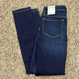 Girls Justice dark wash jeggings. Size 14.